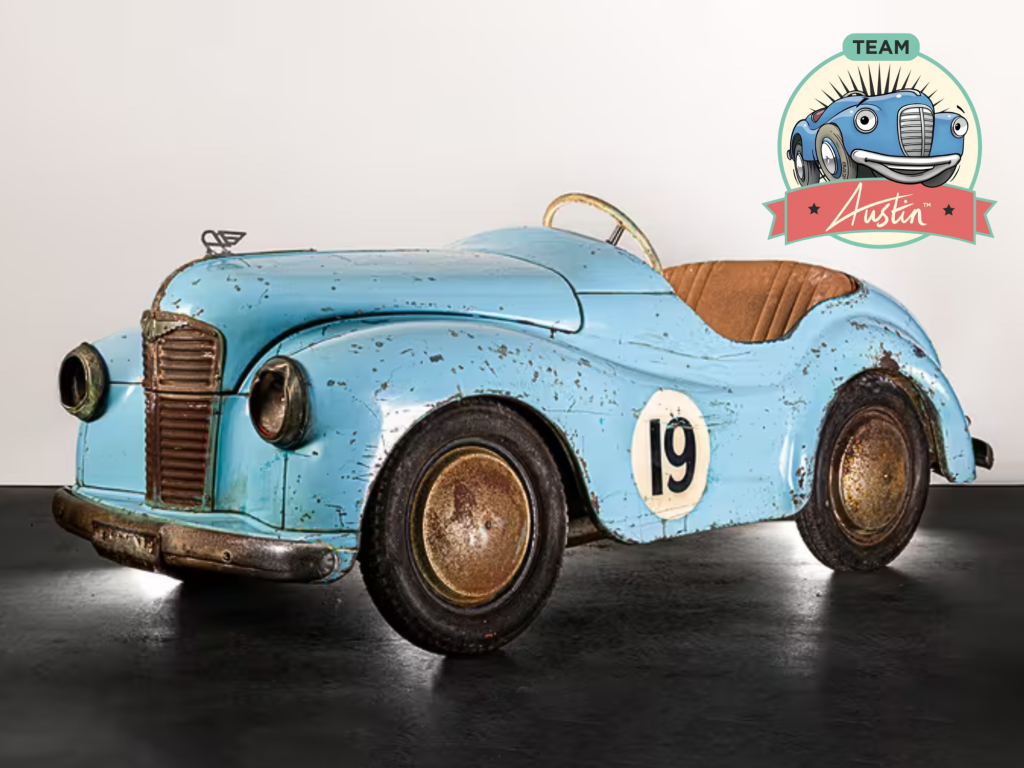 A sky blue coloured pedal car, owned by Ted French.
